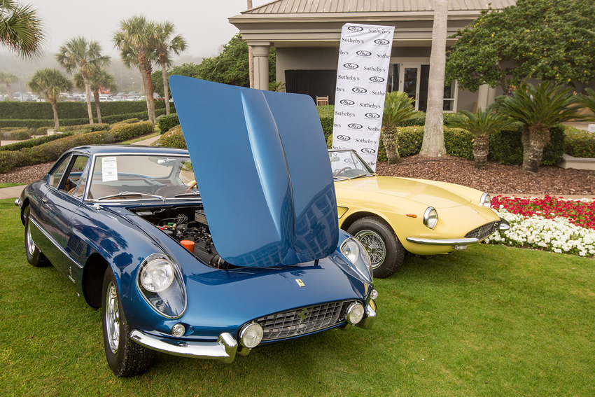 The blue 1962 Ferrari 400 Superamerica LWB Coupe Aerodinamico, foreground, sold for $4,400,000, while the yellow 1968 330 GTS sold for $2,000,000.