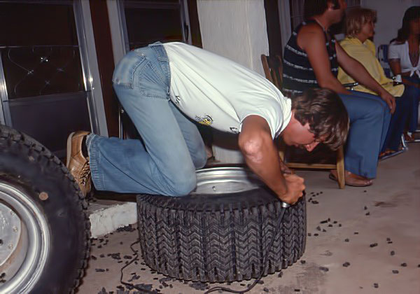 Indy 500 winner Rick Mears hand-cuts traction grooves into his tires for the race. (Photo by Bruce Anderson, courtesy of the Bruce Anderson Collection.)