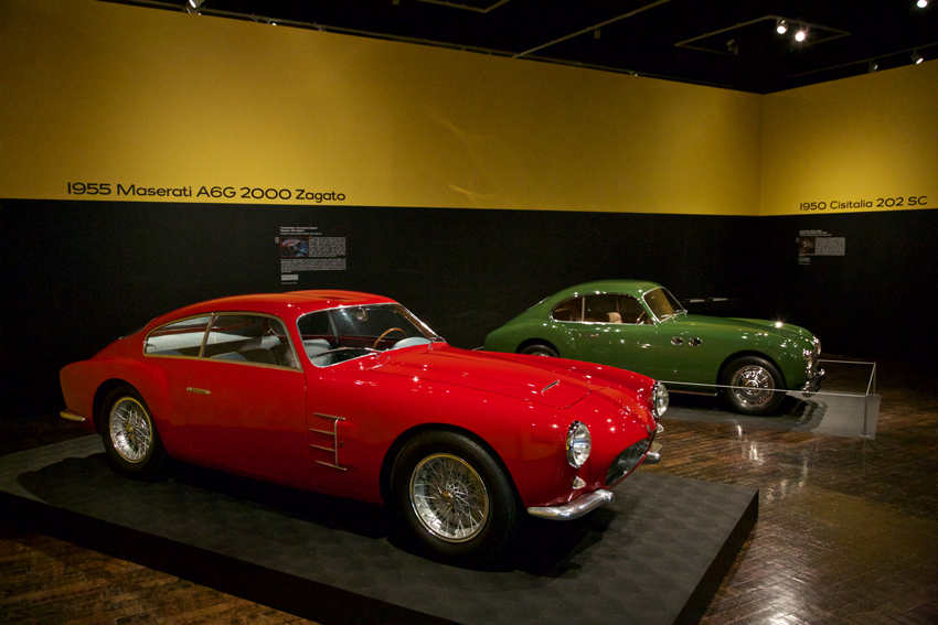 Foreground, the 1955 Maserati A6G 2000 Zagato coupe; behind it is the 1959 Cisitalia 202 SC.
